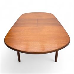 G-Plan - mid-20th century teak oval dining table, with butterfly leaf extension mechanism and four Elliot's of Newbury teak framed dining chairs upholstered in purple and green fabric, table un-extended width 152cm x depth 152cm x height 71cm, chairs 47x37x78cm 