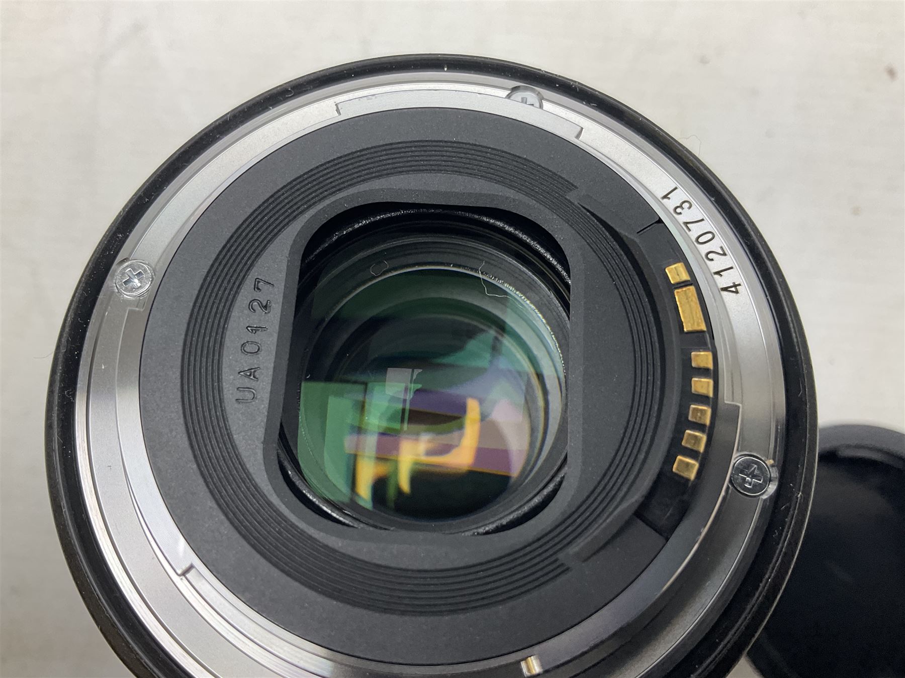 Canon Eos 7D camera body, serial number 3261306344, with 'Canon Ultrasonic EF 24-105mm Macro 0.45m/1.5ft Ultrasonic' Lens, 'Canon Zoom EF 75-300, 1;4-5.6 III' lens and Teleplus Pro 300 lens, together with tripod and original camera box 