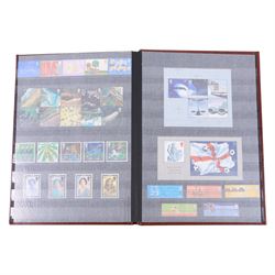 Queen Elizabeth II mint decimal stamps in two folders, face value of usable postage approximately 470 GBP