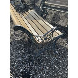 Pair of cast iron and wood slatted garden benches, with matching table - THIS LOT IS TO BE COLLECTED BY APPOINTMENT FROM DUGGLEBY STORAGE, GREAT HILL, EASTFIELD, SCARBOROUGH, YO11 3TX