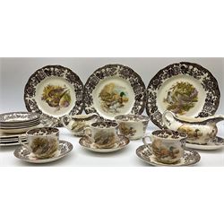 Royal Worcester Palissy Game Series pattern dinner wares, comprising seven dinner plates, six side plates, twelve bowls, sauce boat and stand, six tea cups, eight saucers, further larger saucer, milk jug, and open sucrier. 