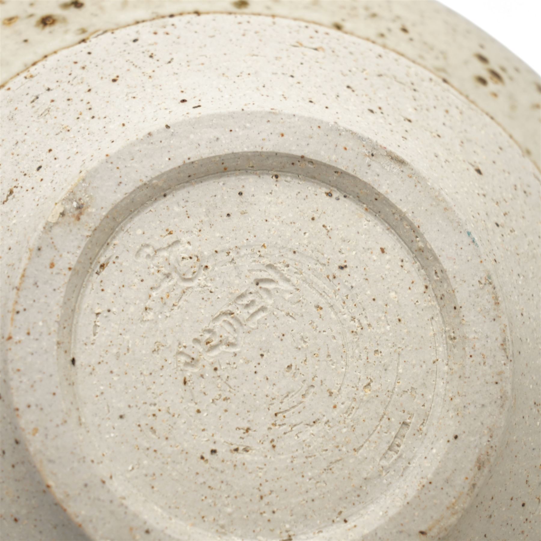 Barbara Cass (1921-1992) for Arden pottery; two studio pottery stoneware vases, one of slender tapered form the other of globular form, in dark green and cream glaze with speckled decoration, impressed marks to bases, tallest H39cm (2)