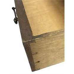 Early to mid-20th century walnut chest, fitted with three graduating drawers with bookmatch veneer facias, raised on square tapering supports