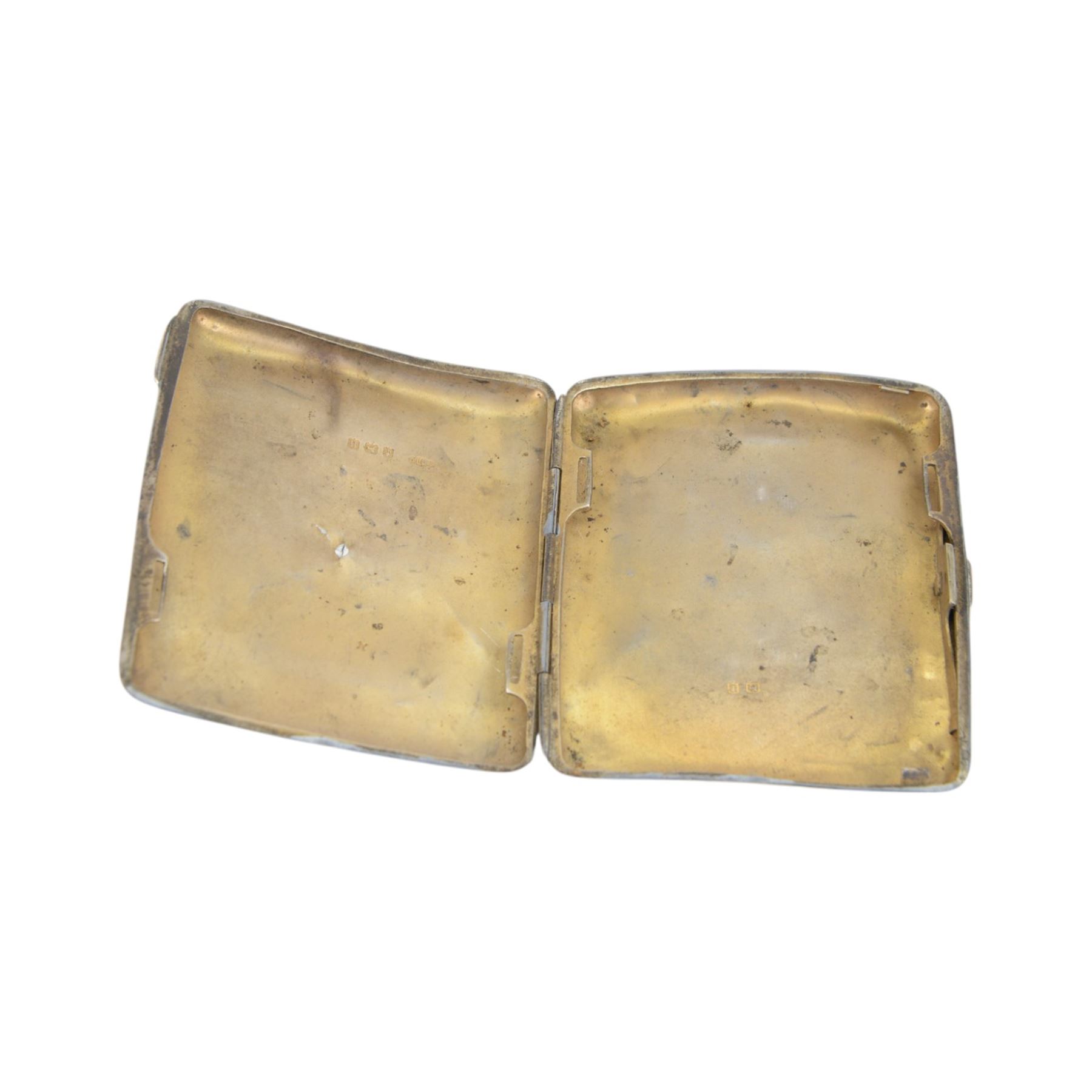 Early 20th century silver cigarette case, together with a small group of silver cutlery including mother of pearl handled pickle fork, cake fork and pair of sugar tongs, all hallmarked