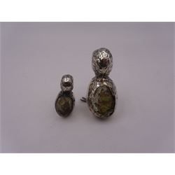 Two Edwardian silver novelty pin cushions, each modelled as a hatching chick, with cushioned backs, both hallmarked Birmingham 1910, maker's mark indistinct, largest H5.7cm