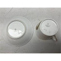 WW2 Nymphenburg cups and saucer, decorated with Imperial German Iron Cross encircled in a foliate boarder with gilt edging, with printed mark beneath 