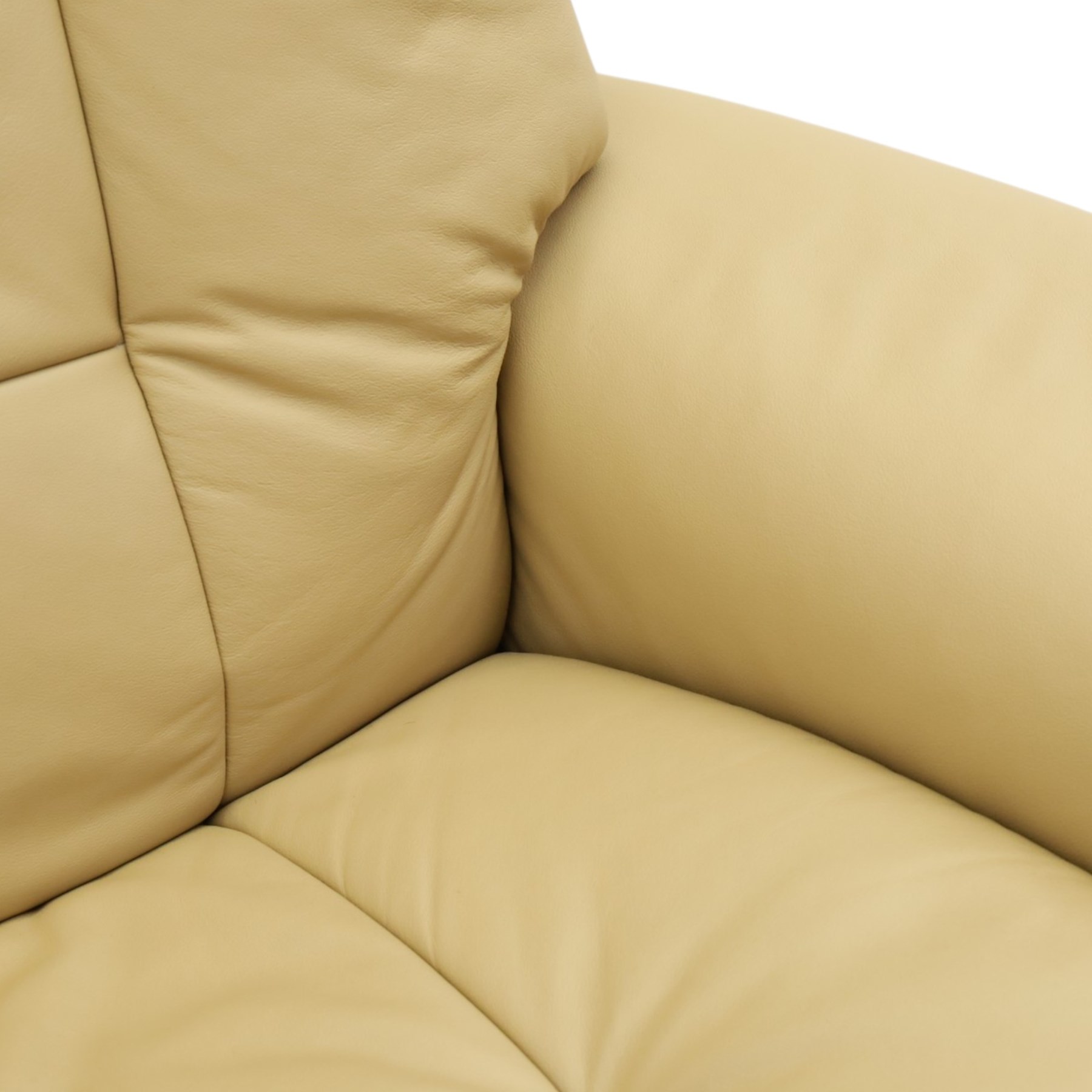 Ekornes Stressless - beech framed reclining two seater sofa, out-swept arms over tapering supports, upholstered in beige leather