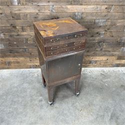 Luxor - industrial modular cabinet, three sections comprising single drawer, double drawer and single cupboard, raised on stand; and a tall industrial cabinet