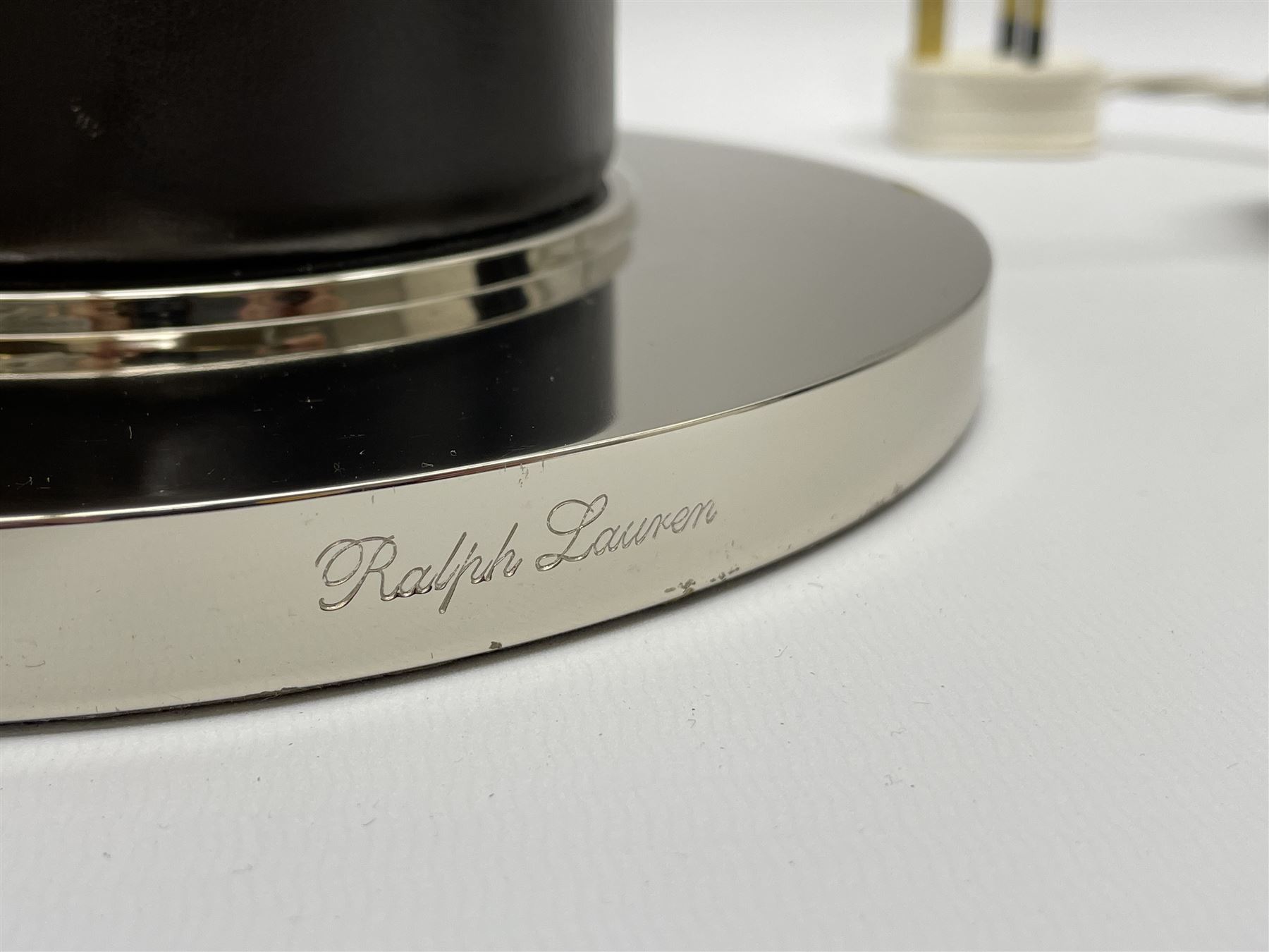 Ralph Lauren - pair 'Beckford' table lamps, cylindrical form in chocolate brown leather, polished metal base, with shades