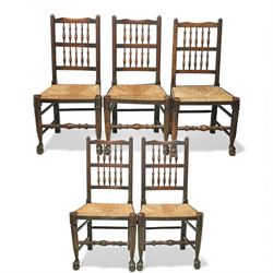 20th century set of five spindle-back dining chairs, with shaped top rails above turned sp...