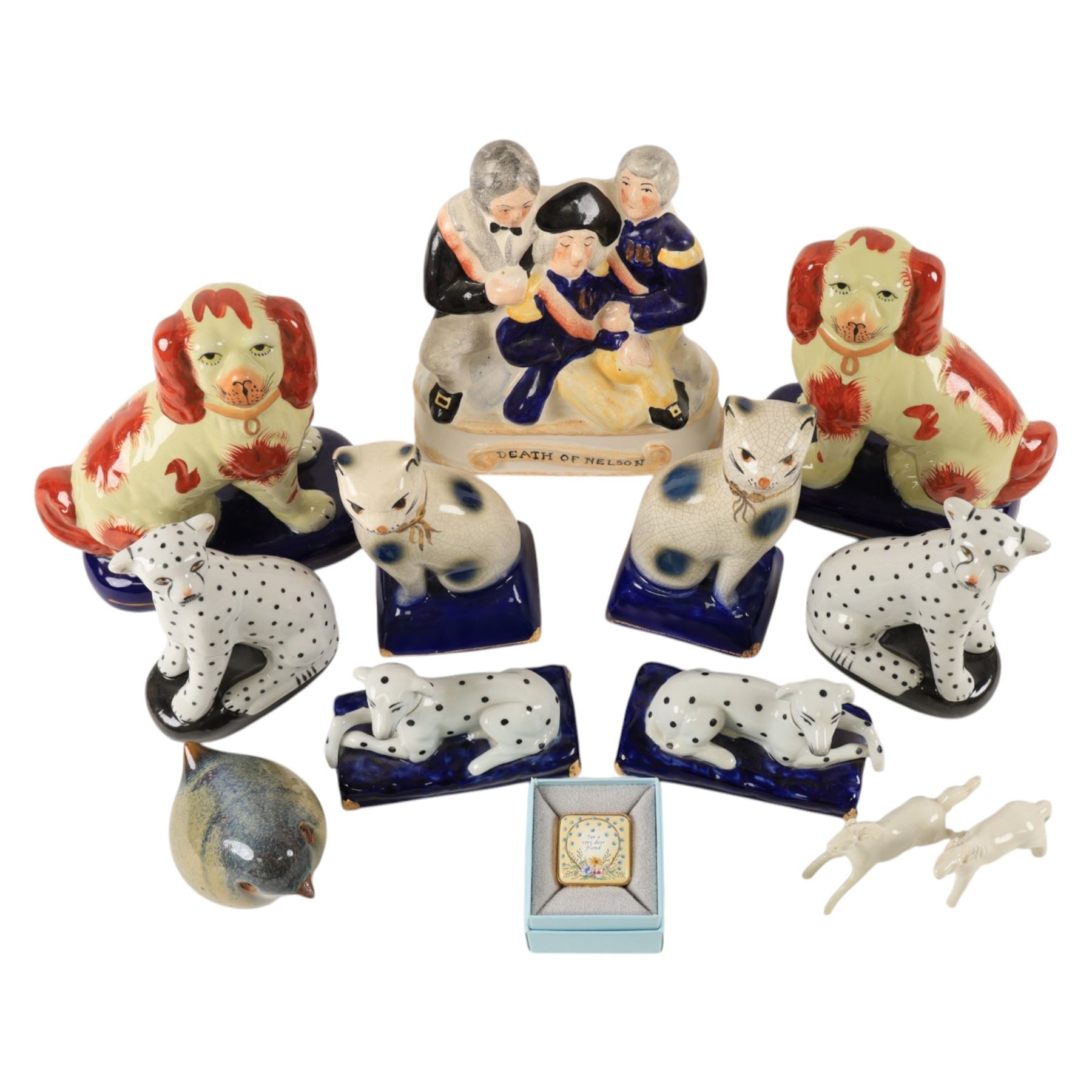 Collection of Staffordshire style figures, including dogs, cats, Death of Nelson etc 