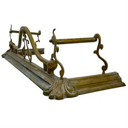 Three 20th century brass fenders, two with pierced Art & Crafts design rails, largest W156cm, D 45cm 