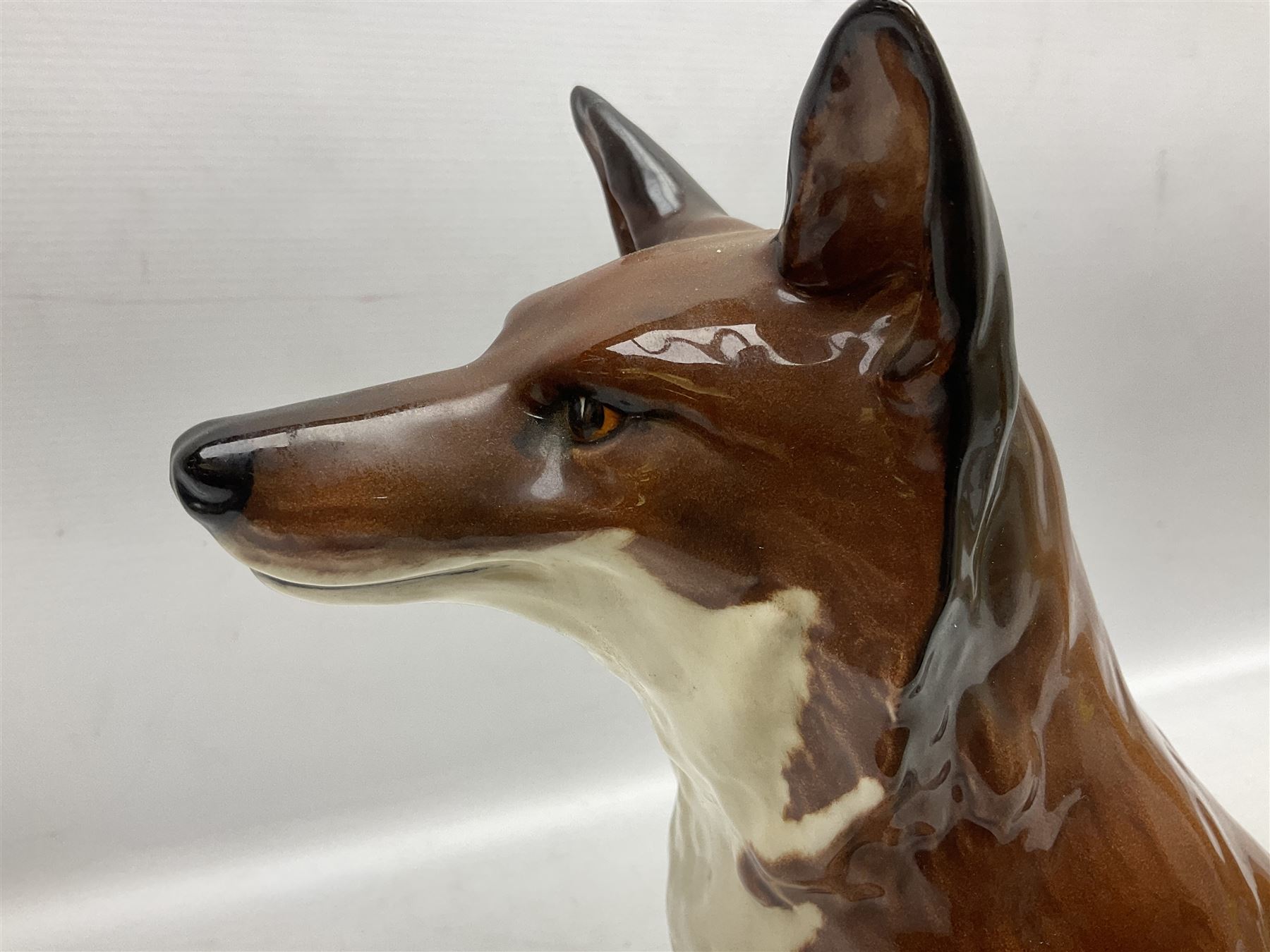 Beswick large fireside fox figure, modelled seated, no 2348, with impressed marks beneath, H31cm