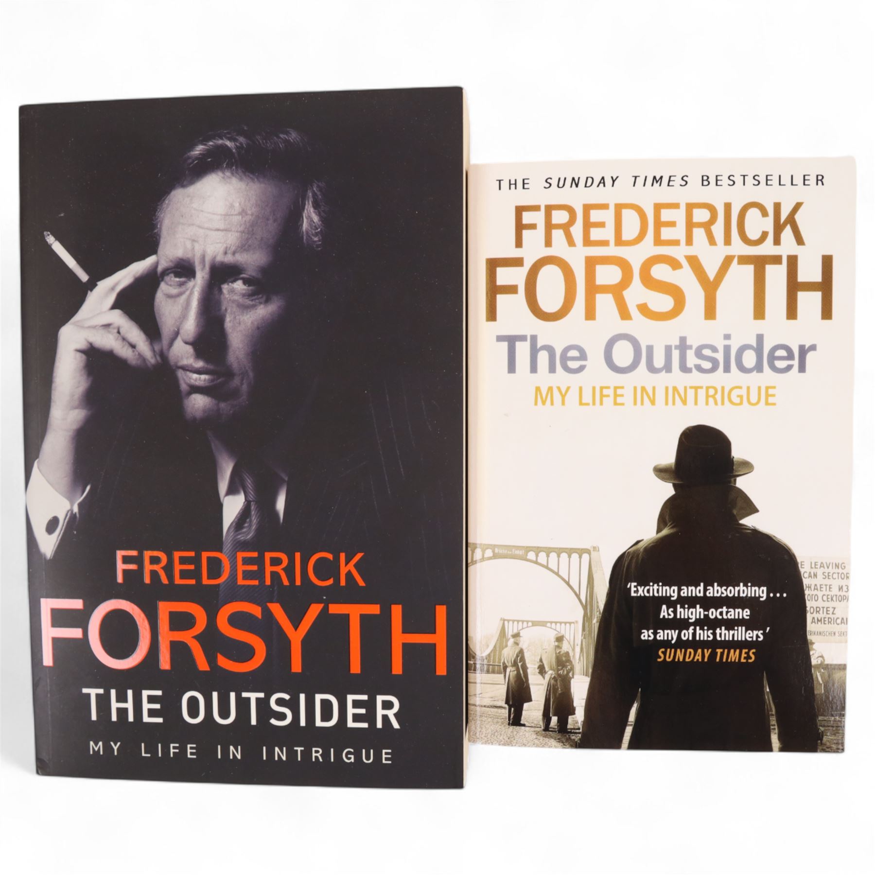Two signed copies of Frederick Forsyth 'The Outsider, My Life in Intrigue', including one first edition