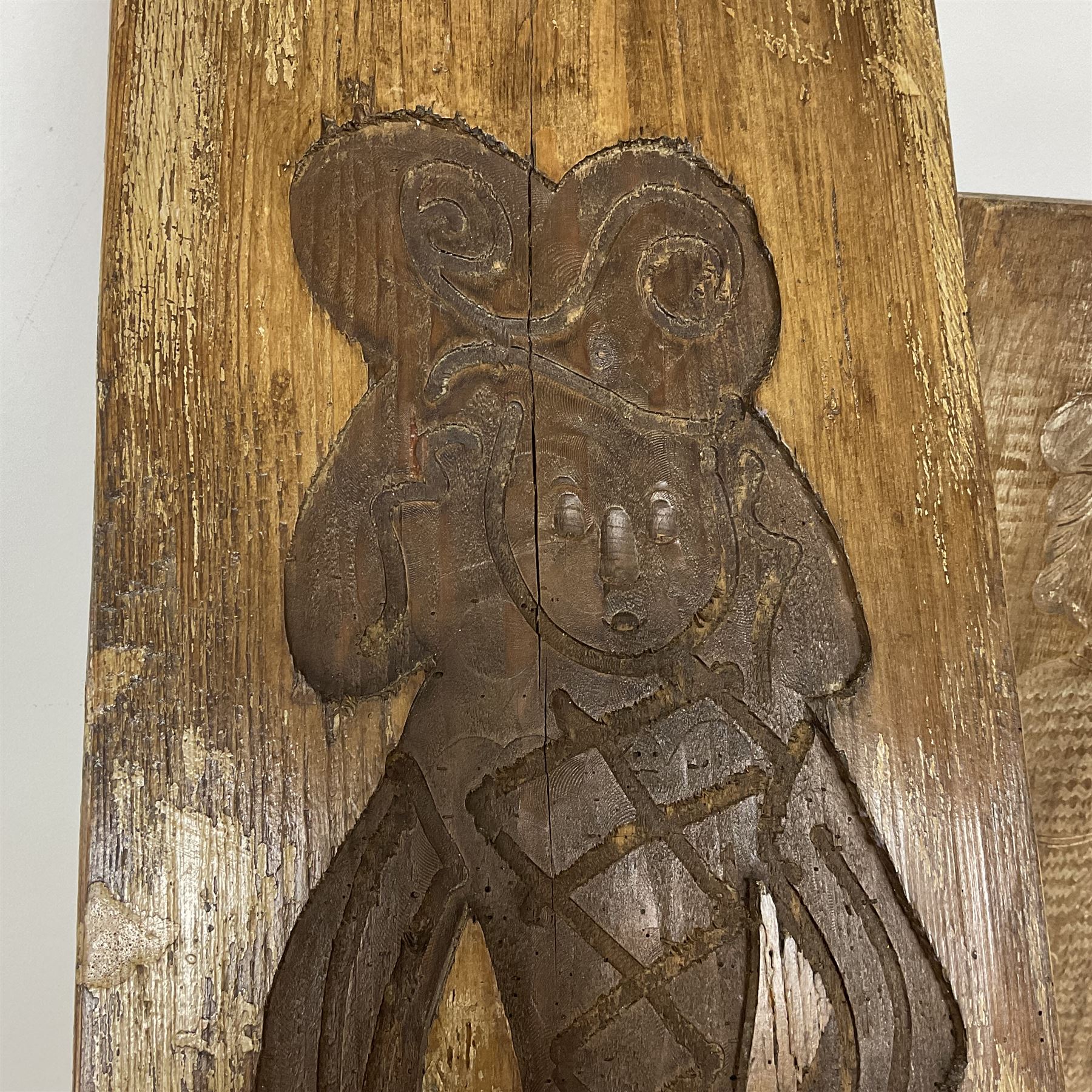 Two 20th century hardwood Dutch folk art Speculaasplank or biscuit moulds, typically carved with figures in traditional dress, largest H101cm