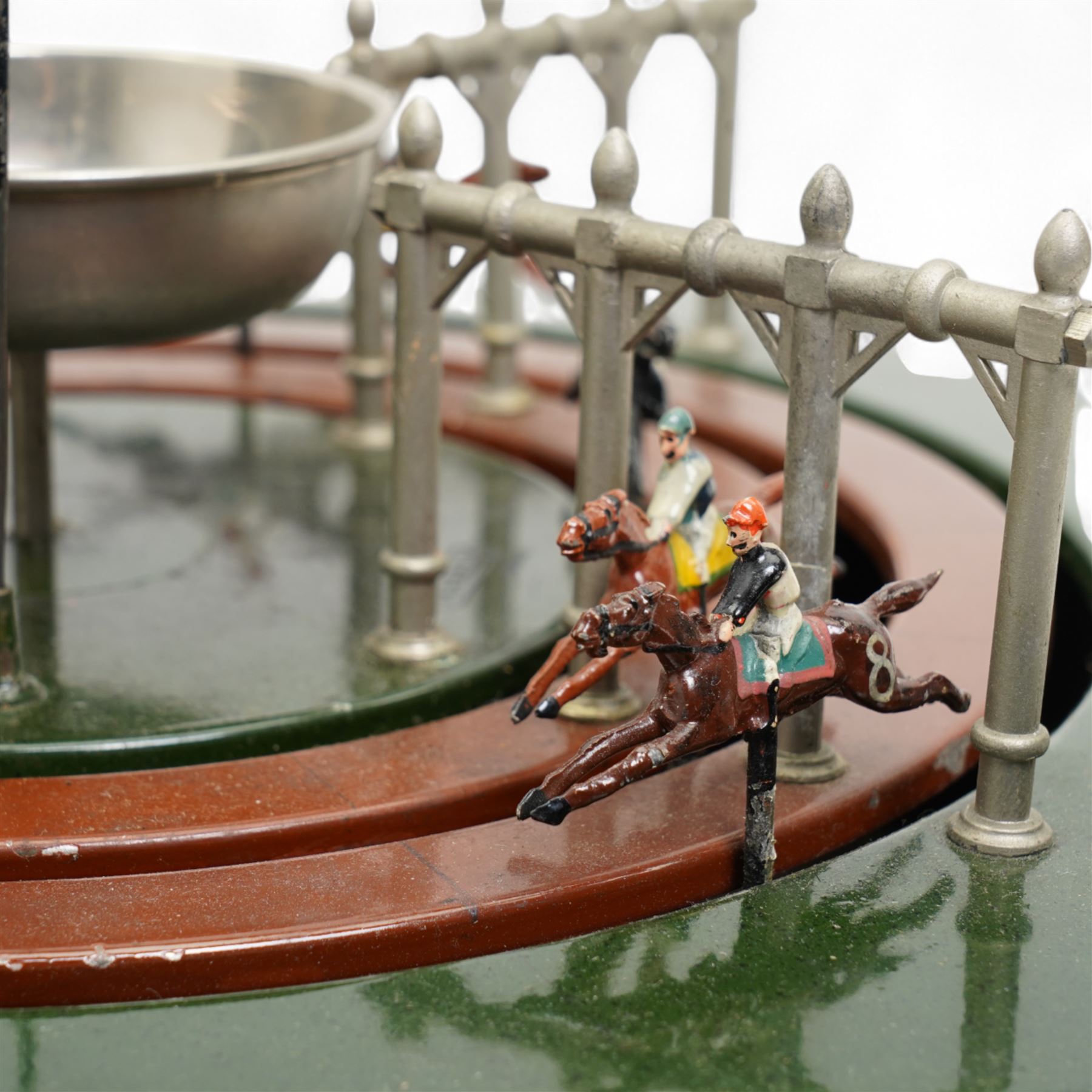 Marklin tin plate lever operated horse racing game with nine numbered horses slotted into tinplate track, wooden box with lift off lid 36cm square