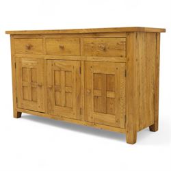 Contemporary solid oak sideboard, rectangular plank top above three drawers and three panelled cupboard doors, fitted with wooden knop handles
