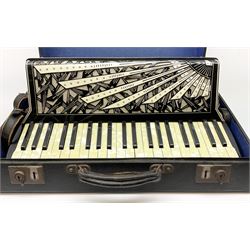 Italian Mantovani piano accordion with Art Deco style black and white case, twenty-four keys and one-hundred and twenty buttons L52cm in carrying case