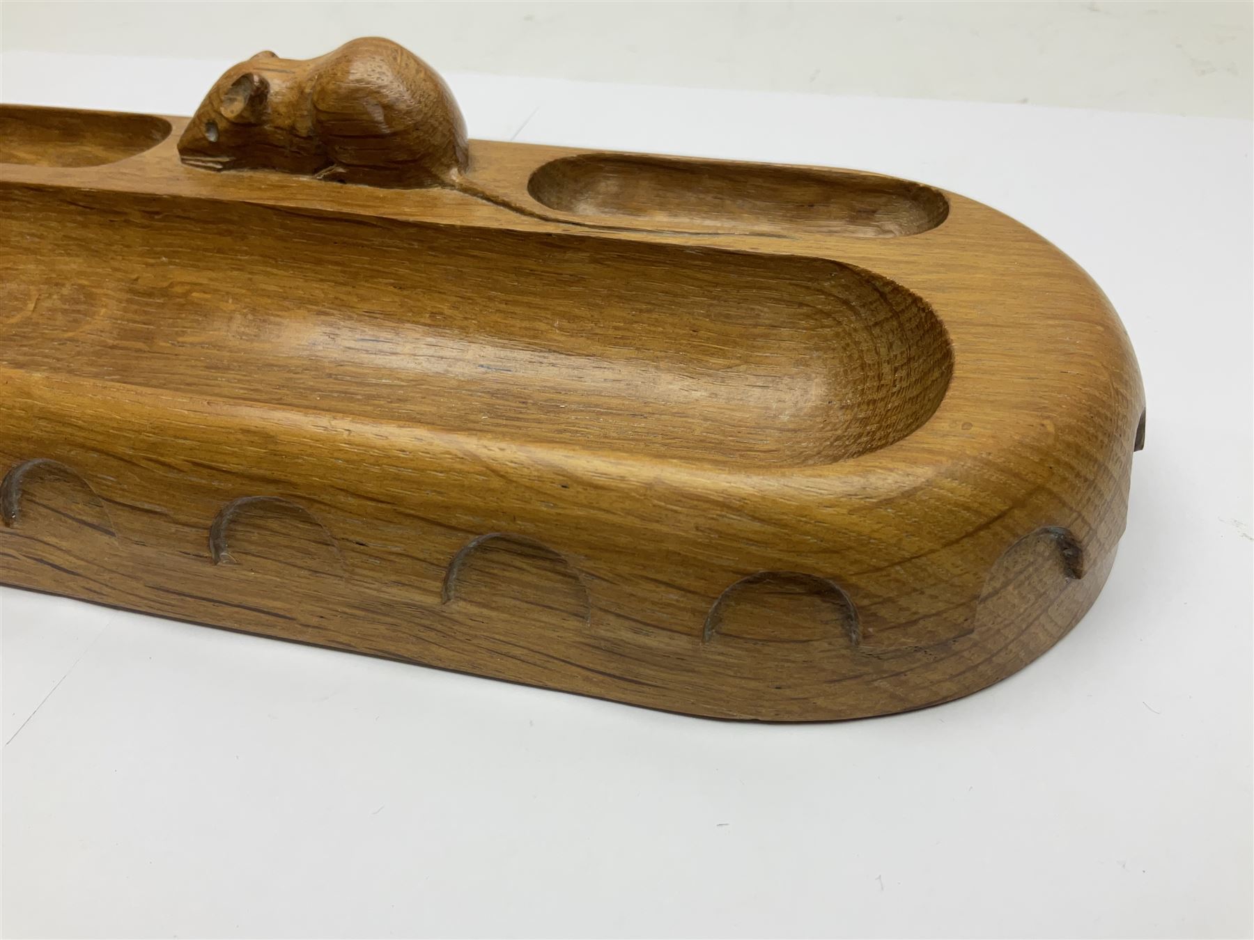 Mouseman - oak pen tray, rectangular form with rounded ends, carved mouse signature over penny moulded edge, by the workshop of Robert Thompson, Kilburn