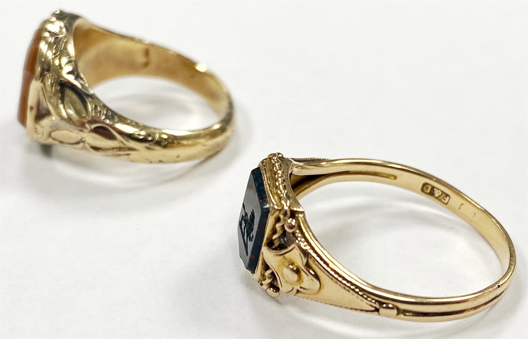 Victorian 15ct gold bloodstone lion intaglio, shield shaped signet ring and a 9ct gold agate dragon intaglio ring