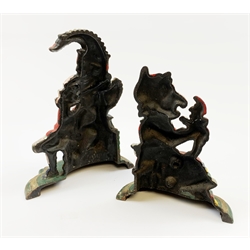 A pair of Victorian cast iron doorstops modelled as Punch and Judy, with painted polychrome decoration, largest H30cm. 