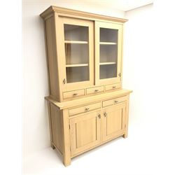 Marks & Spencer's solid light oak dresser, raised back with two sliding display doors above three short and two drawers, two cupboards, stile supports