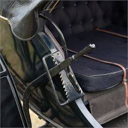 George IV Phaeton Carriage by Mills, Paddington, London

A George IV four wheeled phaeton carriage by Mills, Paddington, London, the hubs stamped accordingly, with black painted bodywork, folding black leather hood, upholstered passenger compartment and rear luggage platform. The carriage is fitted with wooden spoked wheels, yellow coachlining, leaf spring suspension, front mudguards, metal footrests and shafts for single horse use. In original condition by one of the best carriage builders of the day

Features

• Maker’s hubs marked Mills, Paddington, London
• Four wheeled phaeton carriage
• Black painted bodywork with fine yellow coachlining
• Folding black leather hood
• Button upholstered passenger seating
• Rear luggage platform with rail
• Wooden spoked wheels with rubber tyres
• Leaf spring suspension
• Shafts for single horse use
• Front mudguards and metal footrests
• Fitted with a side mounted ratchet hand brake operating on the rear wheel


Dimensions:
Overall length: 305 cm
Width: 160 cm
Height: 213 cm

Wheel Diameters:
Front wheels: 77 cm
Rear wheels: 107 cm

Seating:
Driving seats: 1
Passenger seats: 2