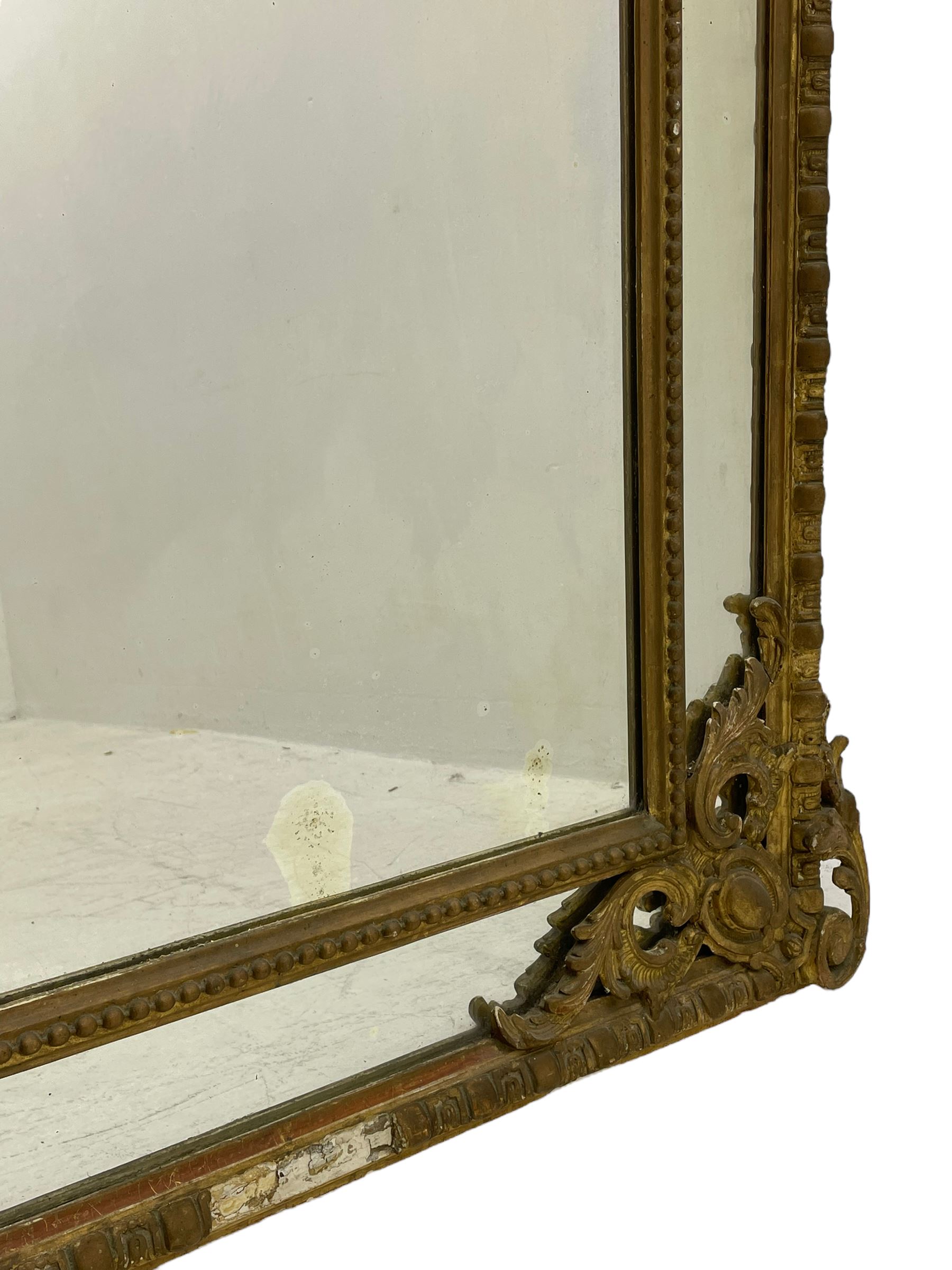 19th century giltwood and gesso pier mirror, shell cartouche pediment decorated with flower heads and scrolling foliage, two bird motifs to each side, egg and dart moulded frame with beaded inner slip, plain mirror plate, each corner mounted by scrolled acanthus leaves and cartouches