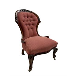 Victorian walnut framed nursing chair, arched cresting rail carved with foliage cartouche, upholstered in buttoned fabric, on cabriole front supports
