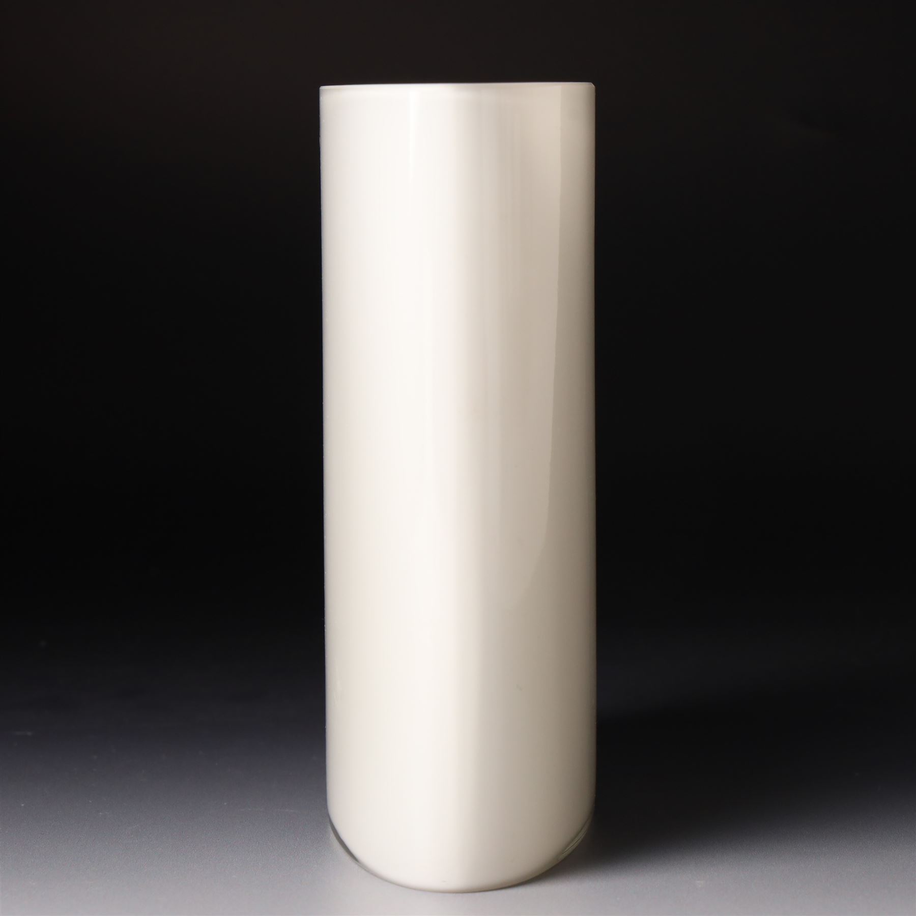 Alvar Aalto (Finnish 1898-1976) for Iittala: Set of three white glass vases, marked Alvar Aalto to base, largest H16cm (3)