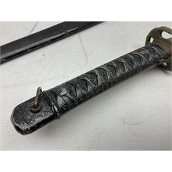 WW2 Japanese Army NCOs sword - katana, the 69.5cm slightly curving fullered blade numbered 14656; arsenal markings stamped near the habaki on the handle; brass tsuba and black painted metal hilt cast to simulate cord bound fish skin; in black painted steel scabbard with single suspension ring L96cm overall