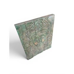 Pair of South East Asian carved wooden panels, depicting Buddha or Deity faces