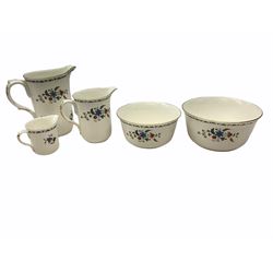 Shelly tea wares decorated in the Chelsea pattern, no 11280, to include toast rack, coffee pot, hot water jug, six cups, fourteen saucers, five egg cups, eleven side plates, etc. 