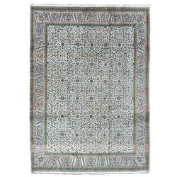 Central Persian Yazd ivory ground carpet, the field decorated with repeating Herati motifs, scroll design border with stylised flower heads 