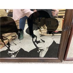Gothic style mirror together with a framed mirror with Laurel and Hardy printed on it