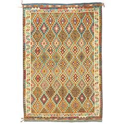 Anatolian Turkish Kilim multi-colour rug, decorated with all over lozenges in contrasting colours with ivory outline, the multi-band ivory border with repeating geometric shapes and small lozenges or diamonds