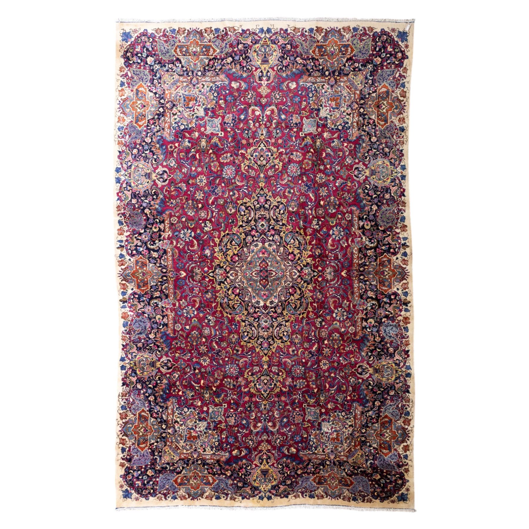 Large North East Persian Meshed hand-knotted carpet with signature, raspberry red field with central shaped cusped medallion, densely decorated with intricate arrangement of scrolling vines, and florals designs within conforming spandrels and a dark ground border richly ornamented with stylized flowers, vase and bird ornamentation, enclosed by guard stripes, with cotton fringe ends