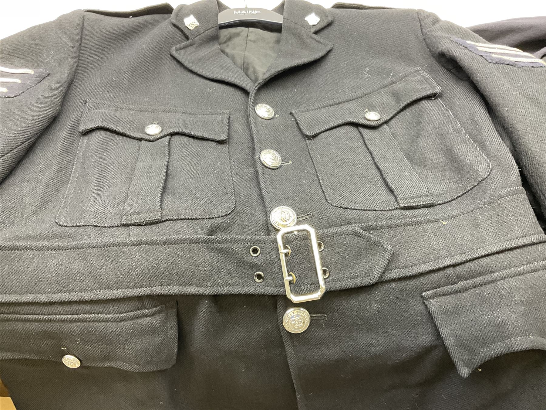 Hull City Police - vintage tunic with matching cape, collar no.H460; another tunic with WW2 medal ribbon bar; early sergeant's tunic; and later sergeant's tunic (5)