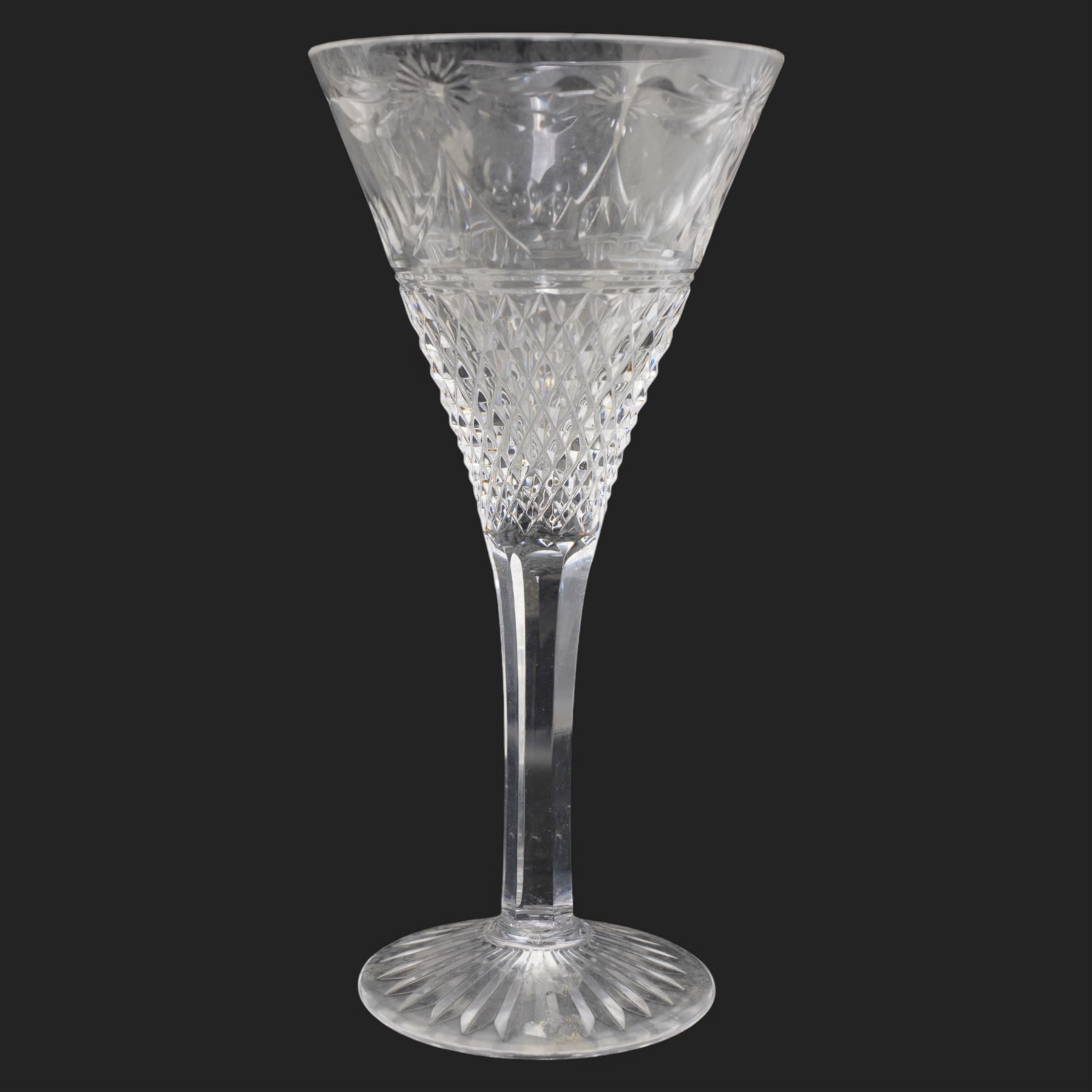 Stuart crystal 'Beaconsfield' pattern drinking glasses comprising twelve wine glasses and four champagne flutes (16)