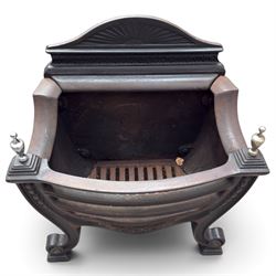 Three cast iron fireplace fittings, comprising a Regency-style fire grate with sunburst crest, urn finials, bowed basket and scroll supports (W58cm H63cm); Victorian fender with pierced acanthus frieze and foliate base (W64cm H20cm); Gothic Revival fireplace with fleur-de-lis crest, arched surround and integral fire basket (W41cm H87cm)
