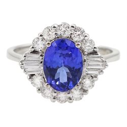 18ct white gold oval tanzanite, taped baguette and round brilliant cut diamond cluster ring, stamped 750, tanzanite approx 1.30 carat, total diamond weight approx 0.50 carat