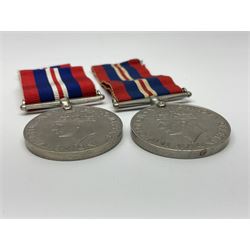 Ten WW2 medals comprising two 1939-1945 war medals, two Defence medals, two 1939-1945 Stars, two Africa Stars, France & Germany Star and Burma Star; together with bar of four miniature medals; all with ribbons