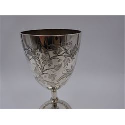 Victorian silver trophy goblet, of typical form, with engraved vine detail to body, bordering a presentation engraving, upon knopped stem and conforming circular domed foot, with beaded edge, hallmarked Henry Holland, London 1875, H19.2cm