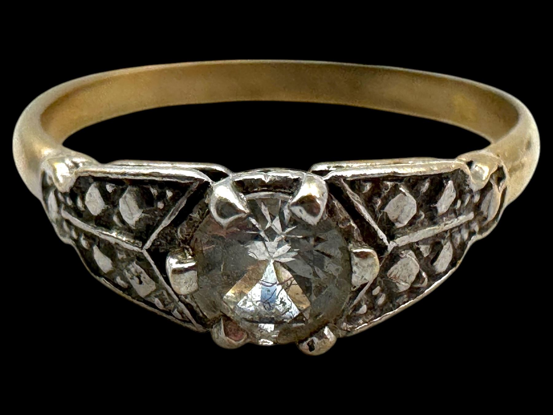 Four 9ct gold stone set rings, including garnet and pearl examples, all stamped or hallmarked