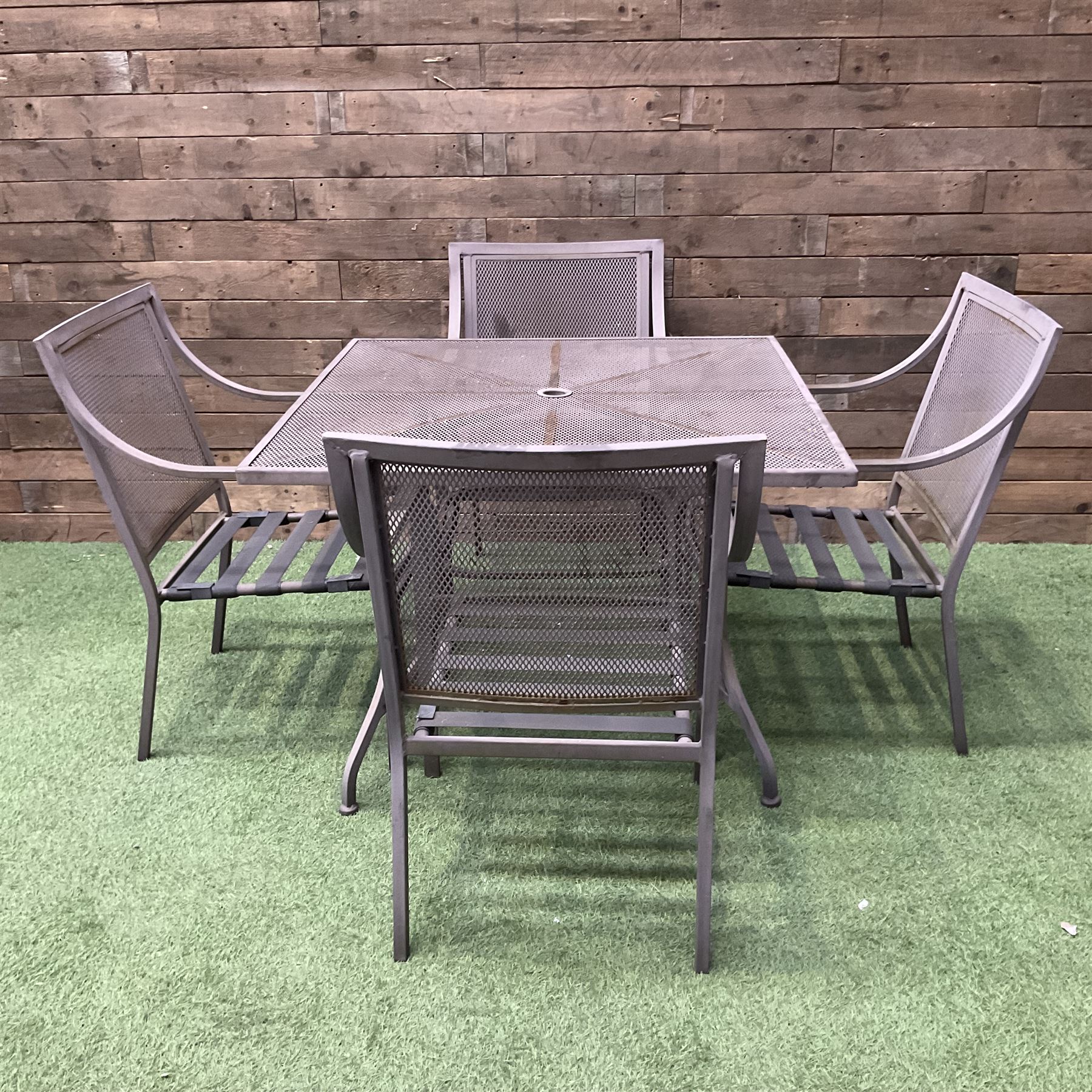 Metal garden table and four chairs - THIS LOT IS TO BE COLLECTED BY APPOINTMENT FROM DUGGLEBY STORAGE, GREAT HILL, EASTFIELD, SCARBOROUGH, YO11 3TX