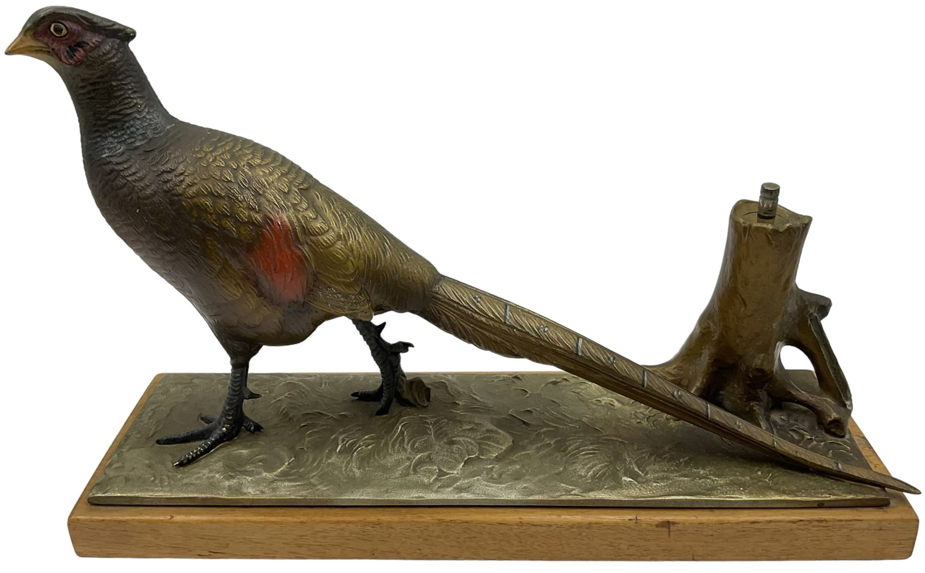 Austrian cold painted spelter table lighter modelled as a pheasant beside a tree stump, on rectangular oak plinth, L31.5cm x H21cm 