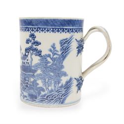 Large 18th century Chinese export blue and white tankard, of cylindrical form with foliate...