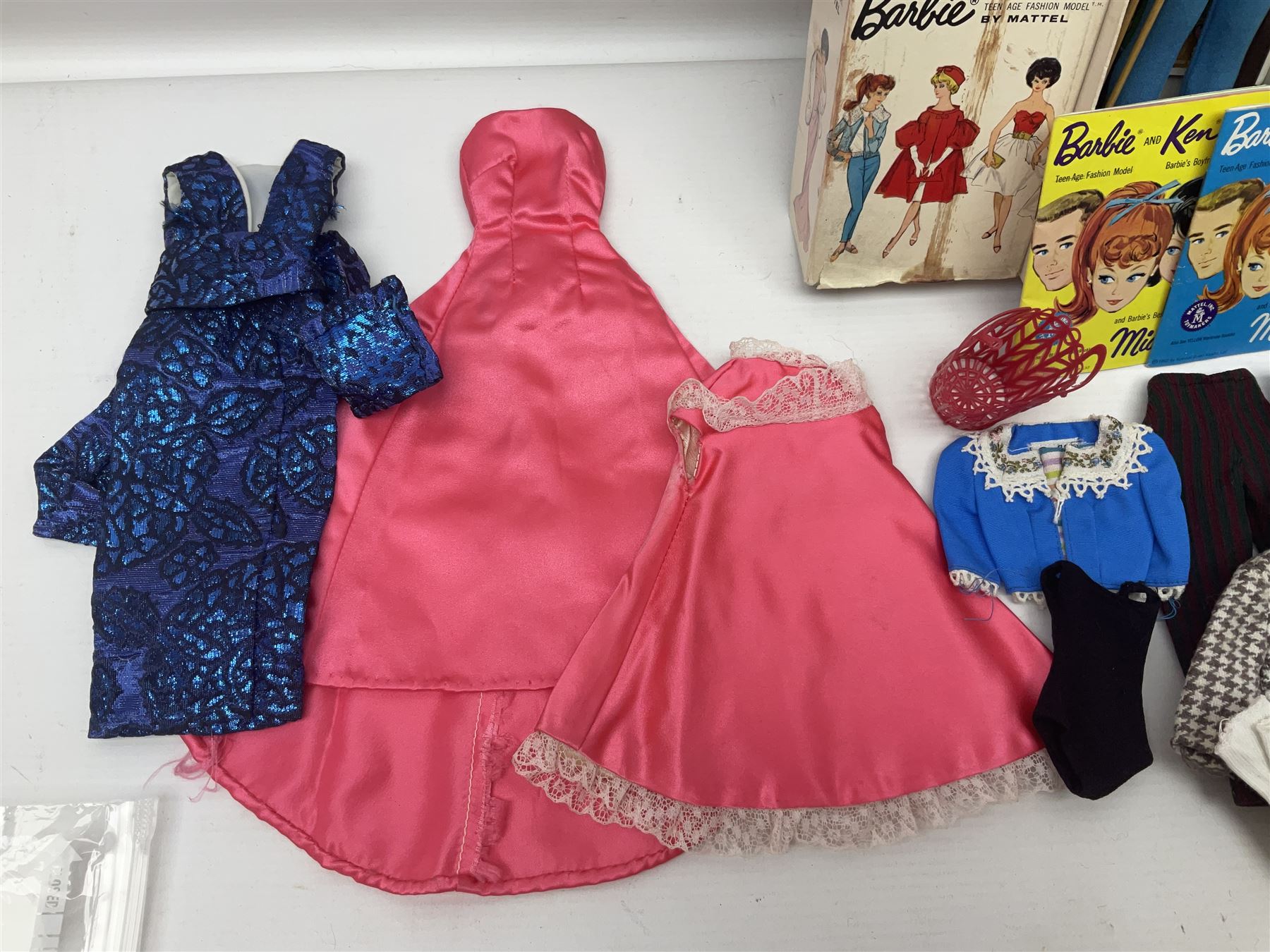 Two 1960s Mattel Barbie fashion dolls - 'Ski Queen' and 'Career Girl'; each in original decorative box with paperwork; and a quantity of Mattel and other fashion doll clothing