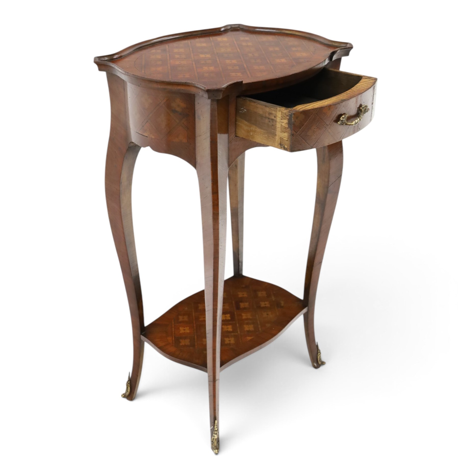 Small French inlaid marquetry and parquetry occasional table or bedside, the shaped top with raised moulded edge and chequered inlay top with crossbanding, fitted with single frieze drawer with gilt-metal handle, raised on cabriole supports united by undertier