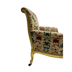 William Bertram & Son of London - pair late 19th century giltwood armchairs, moulded frame with scroll carved back and arm terminals, upholstered in striped fabric with foliate pattern, on shell carved cabriole supports, the brass castors stamped 